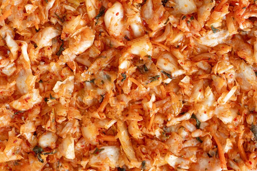 Close up of BIBIBOP kimchi, fermented napa cabbage with Korean chili