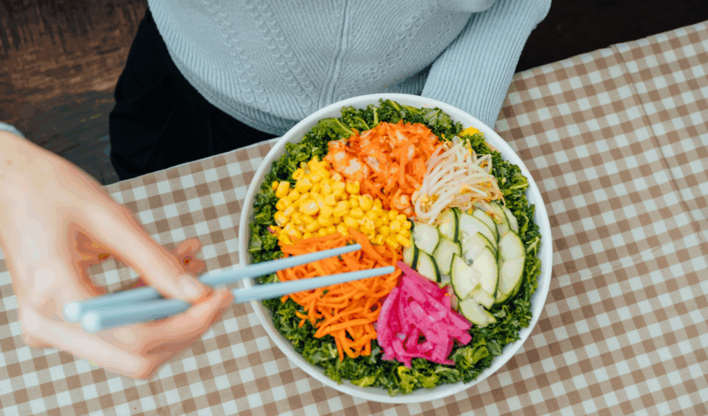 A BIBIBOP Asian Grill bowl with chopsticks